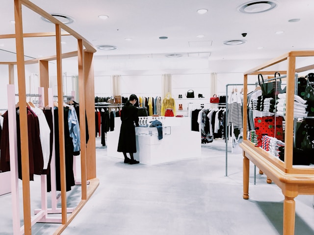 A woman in a retail clothing store