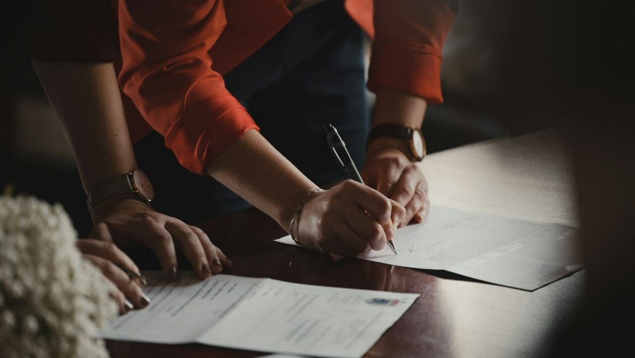 Candidate signing paperwork